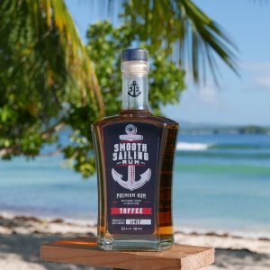 smooth sailing rum bottle on the beach